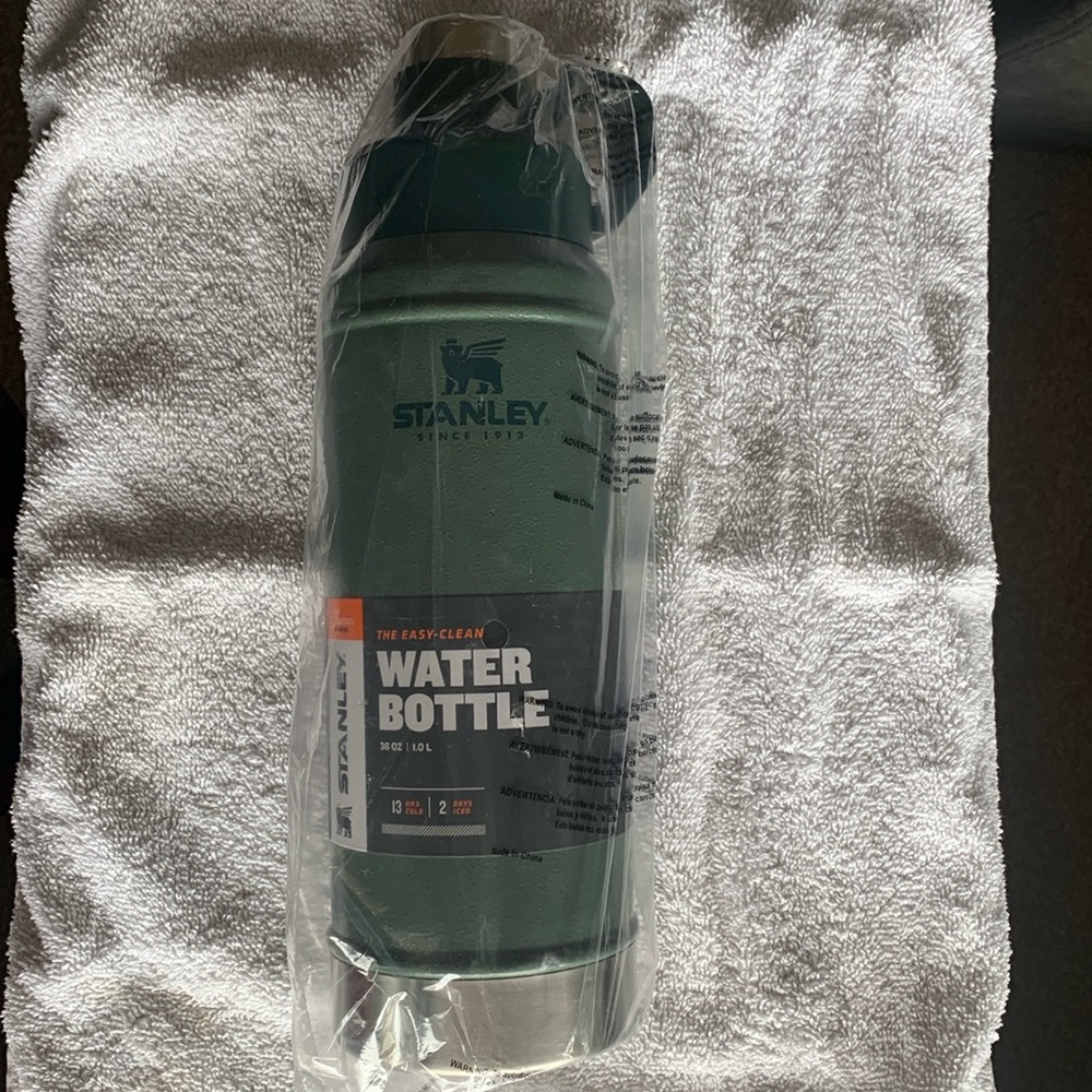 New/Never used Stanley Insulated Easy Clean Water Bottle. 36 oz. 12” tall.